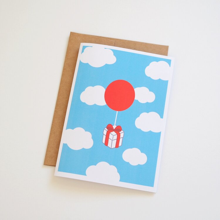 Floating Present | Greeting Card